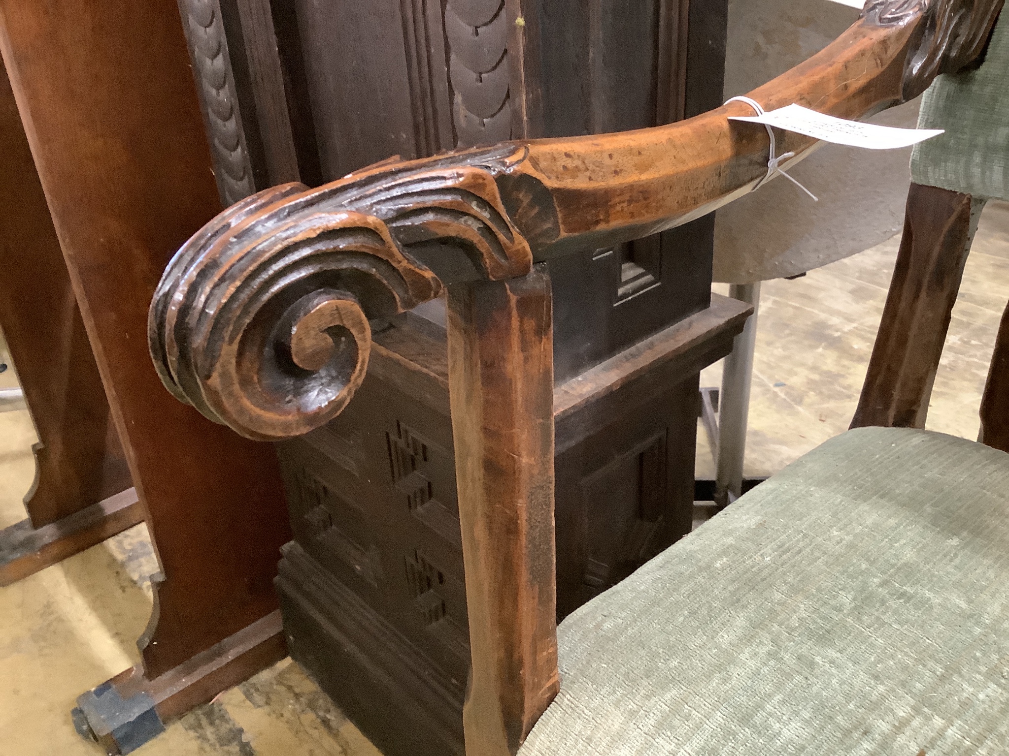 A pair of 18th century French walnut armchairs.